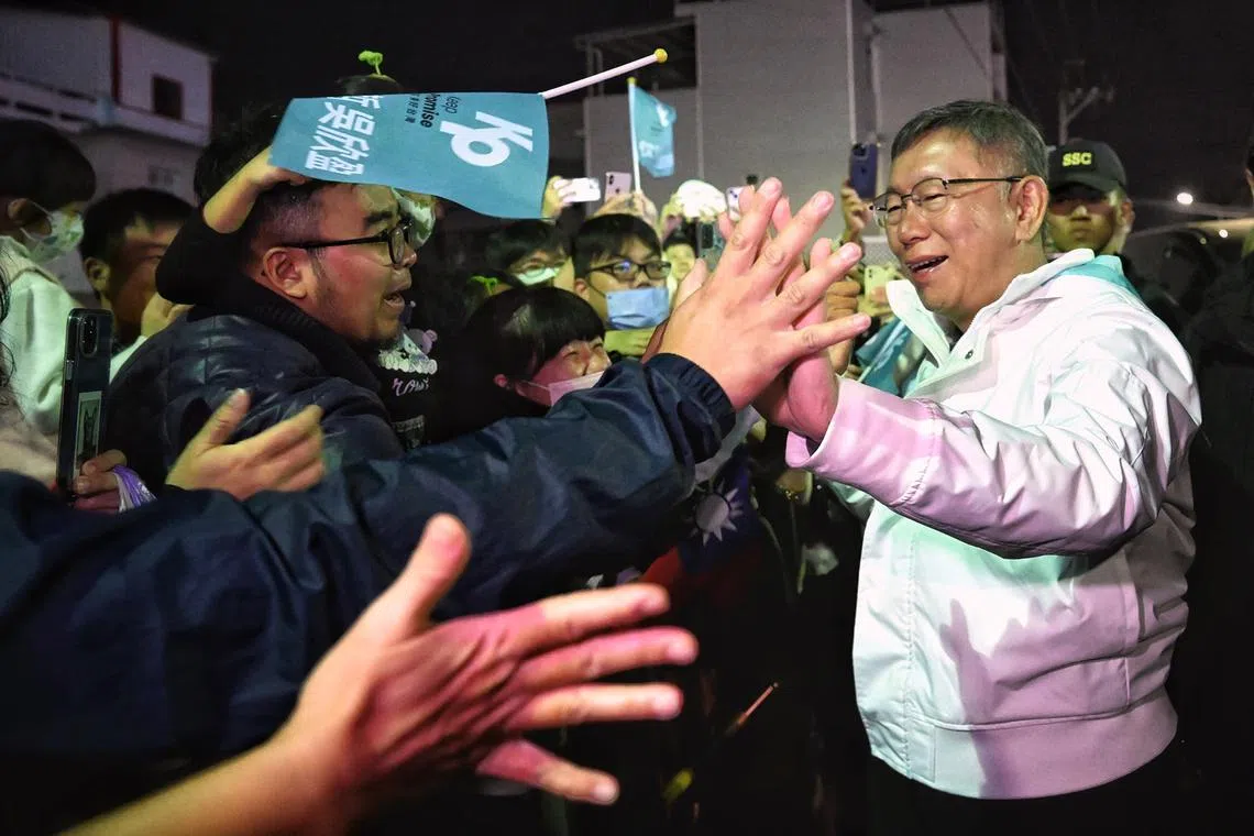Dr Ko Wen-je, the Taiwan People’s Party (TPP) presidential candidate, engaging his supporters at Shanhua night market in Tainan on Jan 9, 2024.