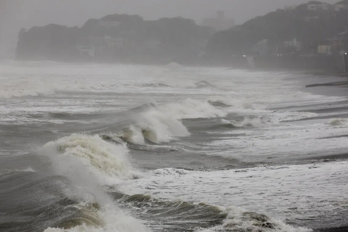 Rough waves hit the coast as Typhoon Dujuan approaches, in Kamakura, Kanagawa Prefecture, Japan, September 21, 2026 in this photo taken by Kyodo. Kyodo/via REUTERS ATTENTION EDITORS - THIS IMAGE HAS BEEN SUPPLIED BY A THIRD PARTY. MANDATORY CREDIT. JAPAN OUT. NO COMMERCIAL OR EDITORIAL SALES IN JAPAN.