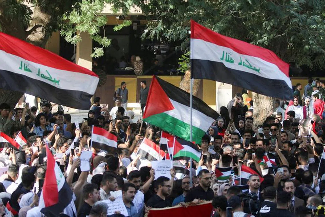 FILE PHOTO: Iraqi students gather during a protest in support of Palestinians in Gaza as the conflict between Israel and Hamas continues, in Baghdad, Iraq, October 18, 2023. REUTERS/Ahmed Saad/File photo