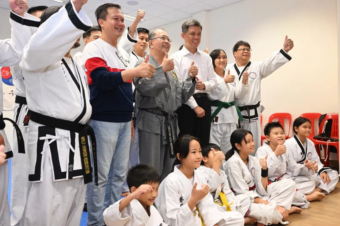 Education Minister Chan Chun Sing (standing, third from right) with the Hanmudo martial arts club on April 20.