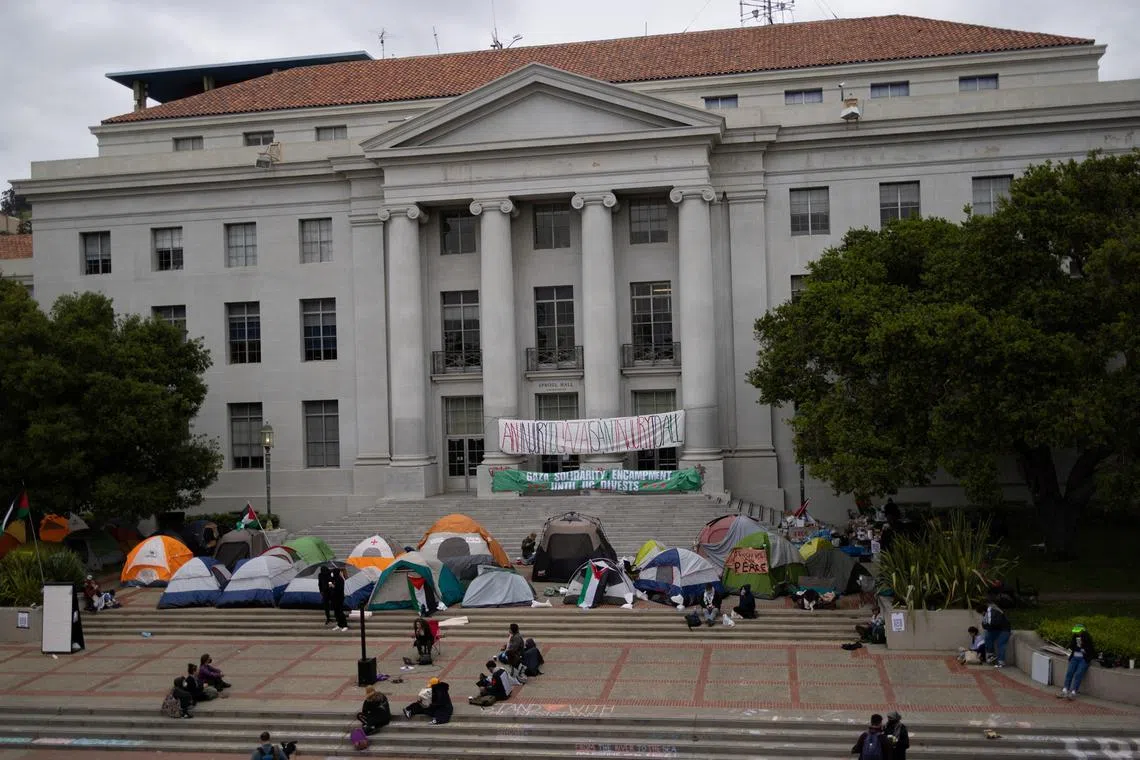 Students attend a protest encampment in support of Palestinians at University of California, Berkeley during the ongoing conflict between Israel and the Palestinian Islamist group Hamas, in Berkeley, U.S., April 23, 2024. REUTERS/Carlos Barria