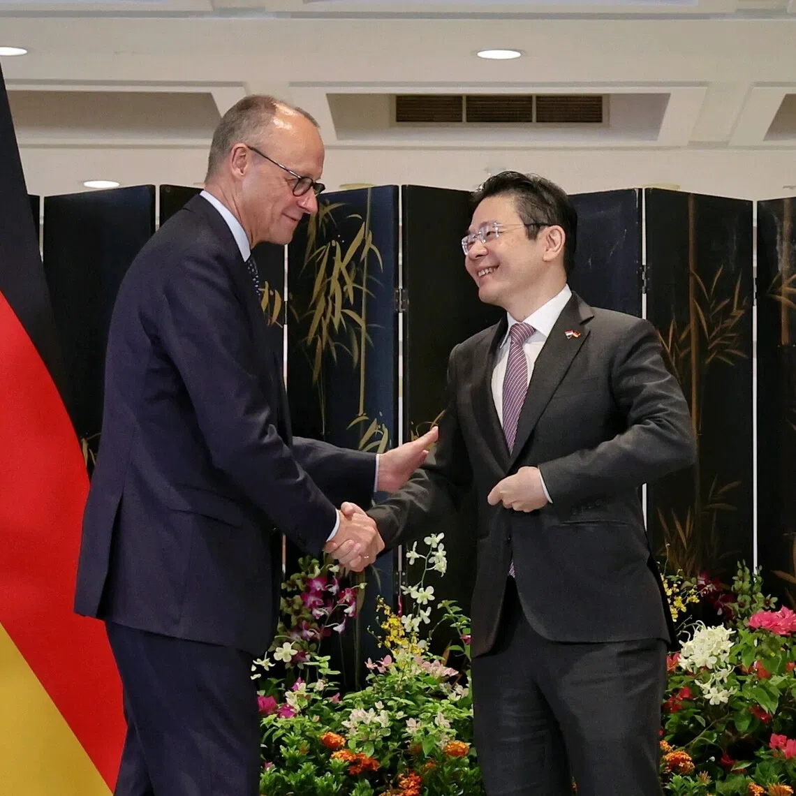 Prime Minister Lawrence Wong (right) and Chancellor of Germany Friedrich Merz at a joint press conference at the Parliament House on Oct 27.