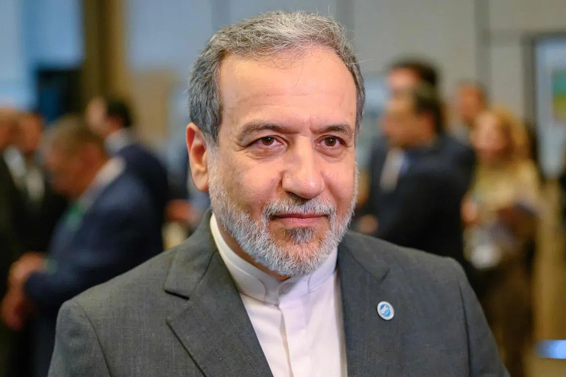 Iranian Foreign Minister Abbas Araghchi said in a piece for Britain's Guardian that Iran was willing to accept limits on its nuclear programme if international sanctions were lifted.