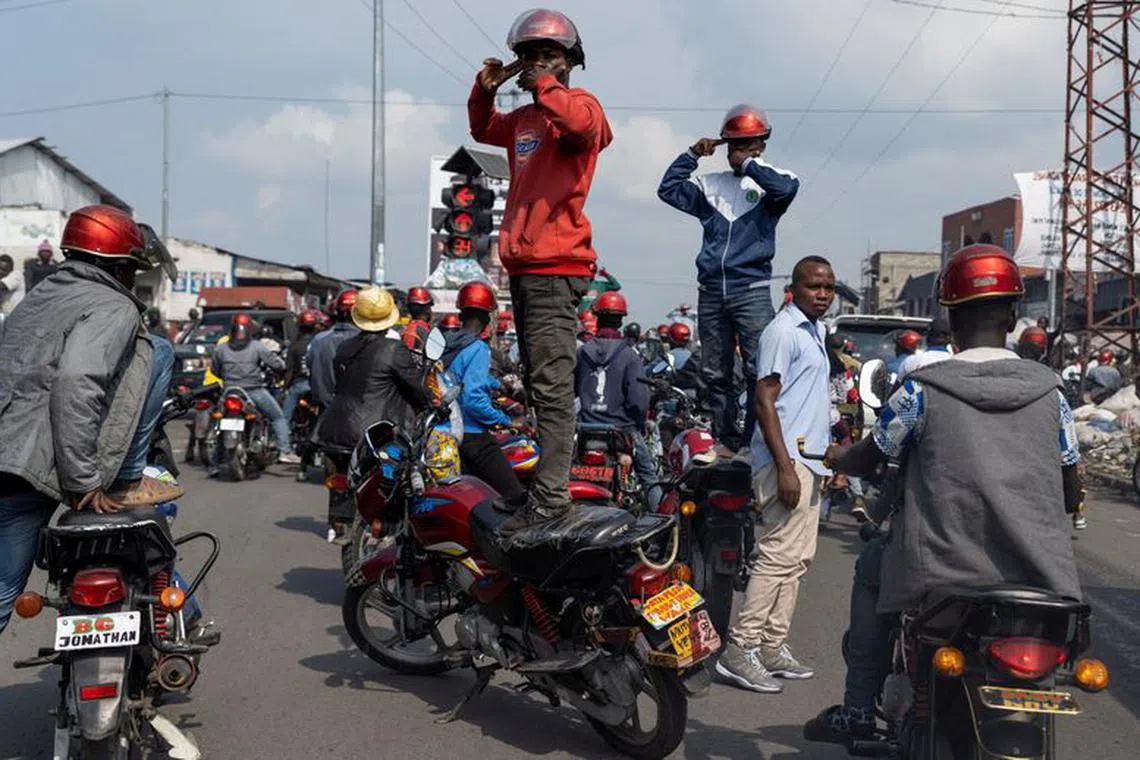 Activists gesture as they march during a demonstration calling for an end to the fighting between the M23 rebels and the Congolese army and denouncing the international community's silence on the conflicts in Goma, North Kivu province of the Democratic Republic of Congo February 19, 2024. REUTERS/Arlette Bashizi