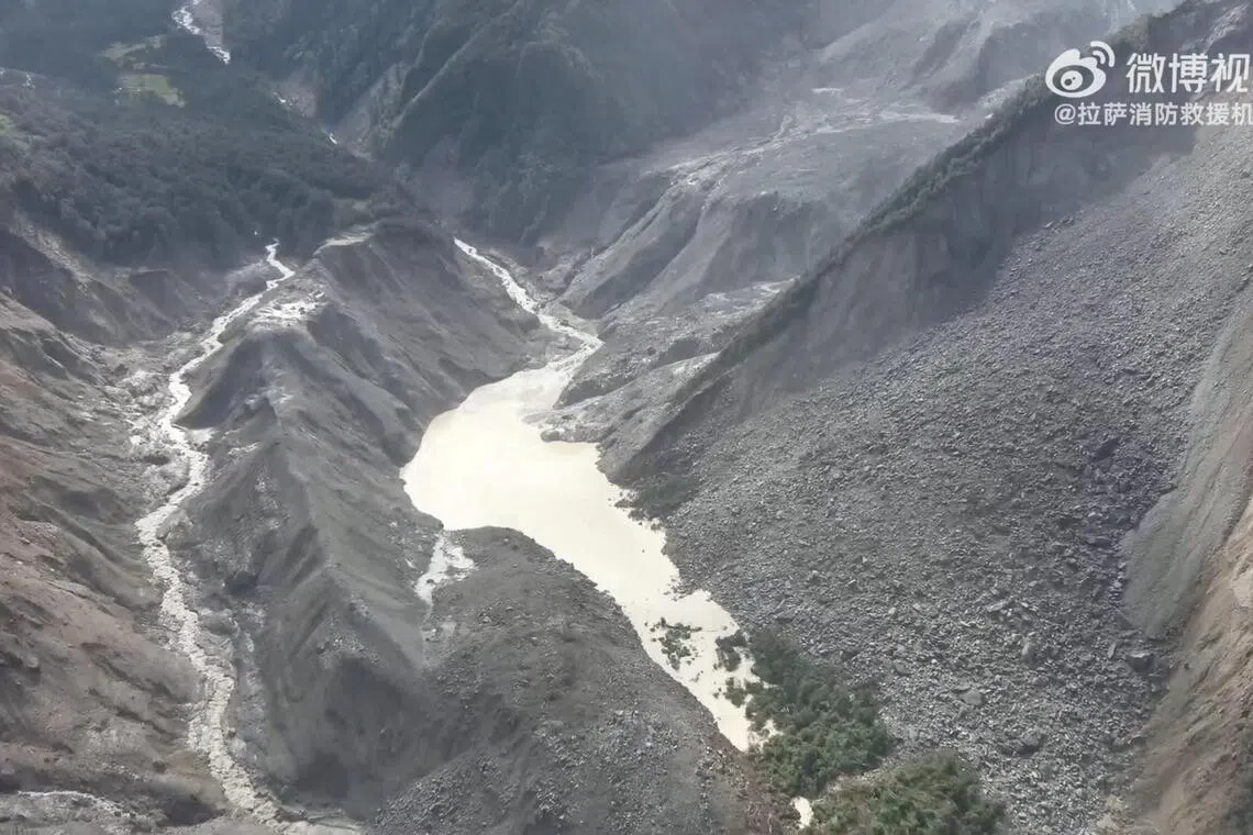 A drone view shows a barrier lake formed following a mudslide, in the border area between Tibet, China and Nepal on Aug 27.