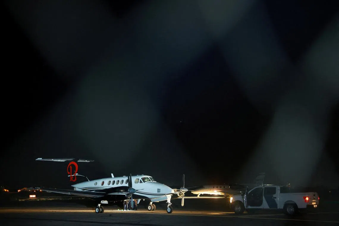 FILE PHOTO: A plane believed to have carried Mexican drug lord Ismael \"El Mayo\" Zambada and Joaquin Guzman Lopez, the son of Zambada's former partner, Joaquin \"El Chapo\" Guzman, who were arrested in El Paso, Texas, is seen on the tarmac of the Dona Ana County private airport, in Santa Teresa, New Mexico, U.S., July 25, 2024. REUTERS/Jose Luis Gonzalez/File Photo