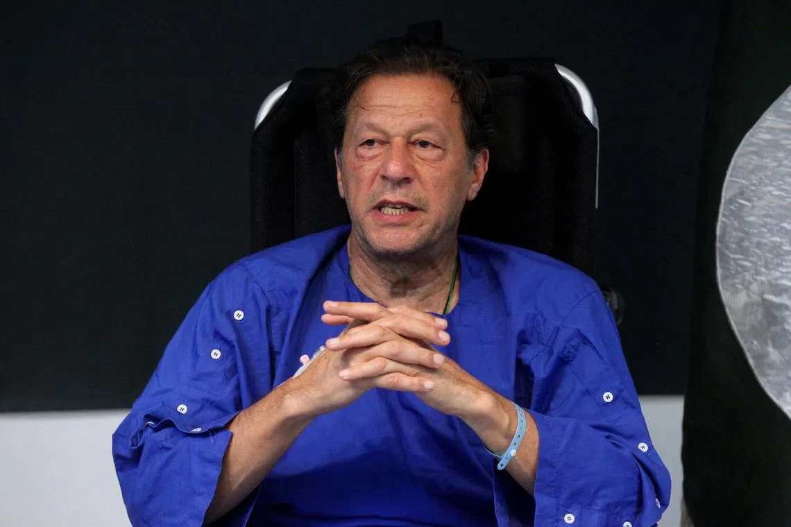 Former PM Imran Khan addresses the media at a hospital in Lahore, a day after an assassination attempt on him, on Nov 4.