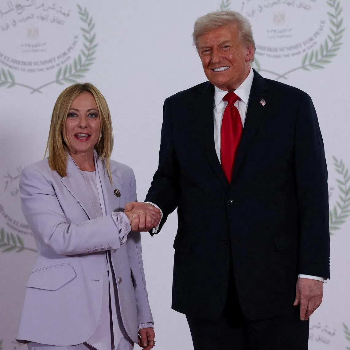 FILE PHOTO: U.S. President Donald Trump and Italian Prime Minister Giorgia Meloni in Sharm el-Sheikh, Egypt, October 13, 2025. REUTERS/Suzanne Plunkett/Pool/File Photo