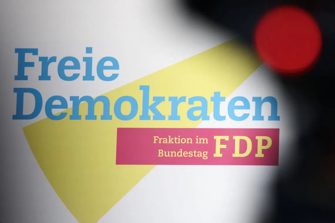 The parliamentary faction logo of Germany's Free Democratic Party (FDP) is seen at the Bundestag, Germany’s lower house of parliament, in Berlin, Germany, November 5, 2024.  REUTERS/Liesa Johannssen