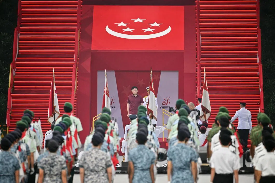 Prime Minister Lawrence Wong arriving at the National Day parade at The Kallang, on Aug 9, 2026.

/Singapore celebrating its 61st National Day, themed ?Go Beyond!?, at the National Stadium on Aug 9, 2026.