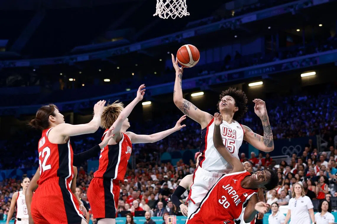 USA's Brittney Griner goes for a rebound in the women's Group C basketball match against Japan at the Paris Olympics. The Americans won 102-76.