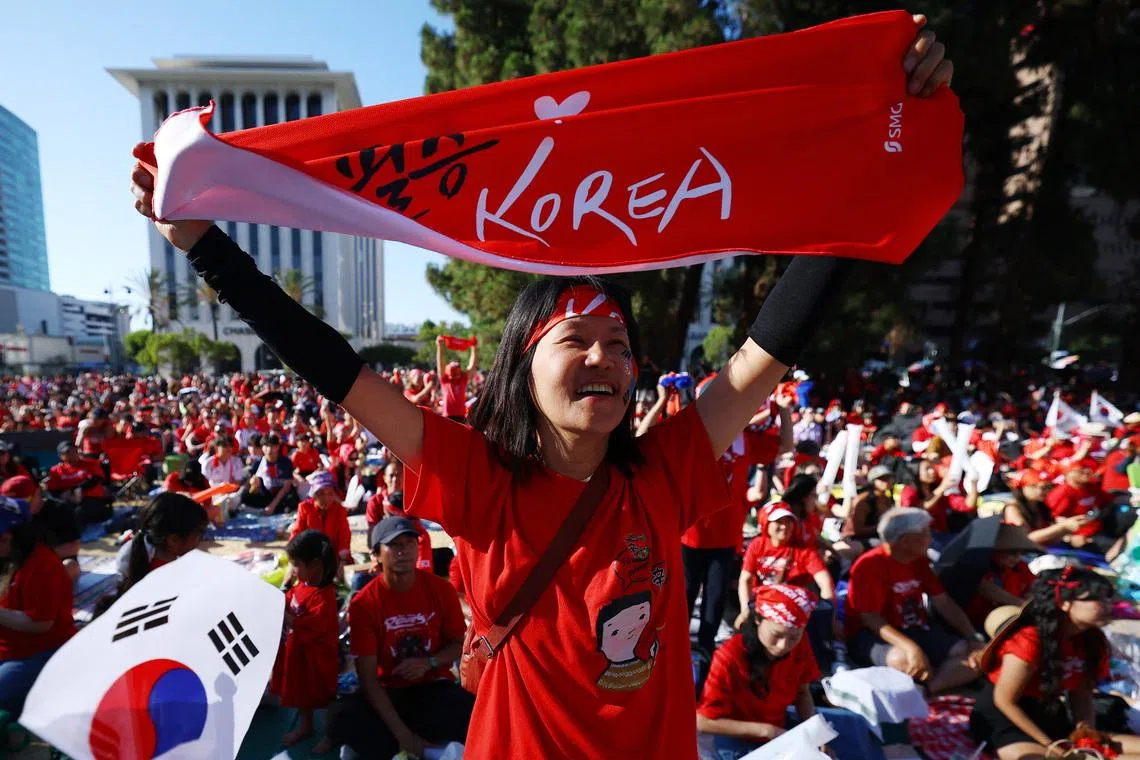 Soccer Football - FIFA World Cup 2026 - Group A - South Africa v South Korea - Fans gather in Los Angeles - Los Angeles, California, U.S. - June 24, 2026 A South Korea fan reacts as they gather to watch the match in Los Angeles REUTERS/Lisi Niesner