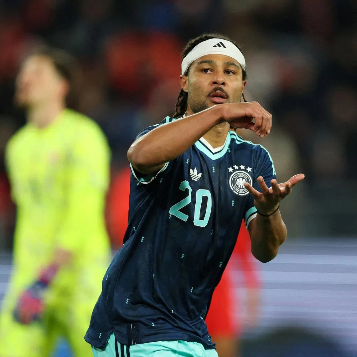 FILE PHOTO: Soccer Football - International Friendly - Switzerland v Germany - St. Jakob-Park, Basel, Switzerland - March 27, 2026 Germany's Serge Gnabry celebrates scoring their second goal REUTERS/Denis Balibouse/File Photo