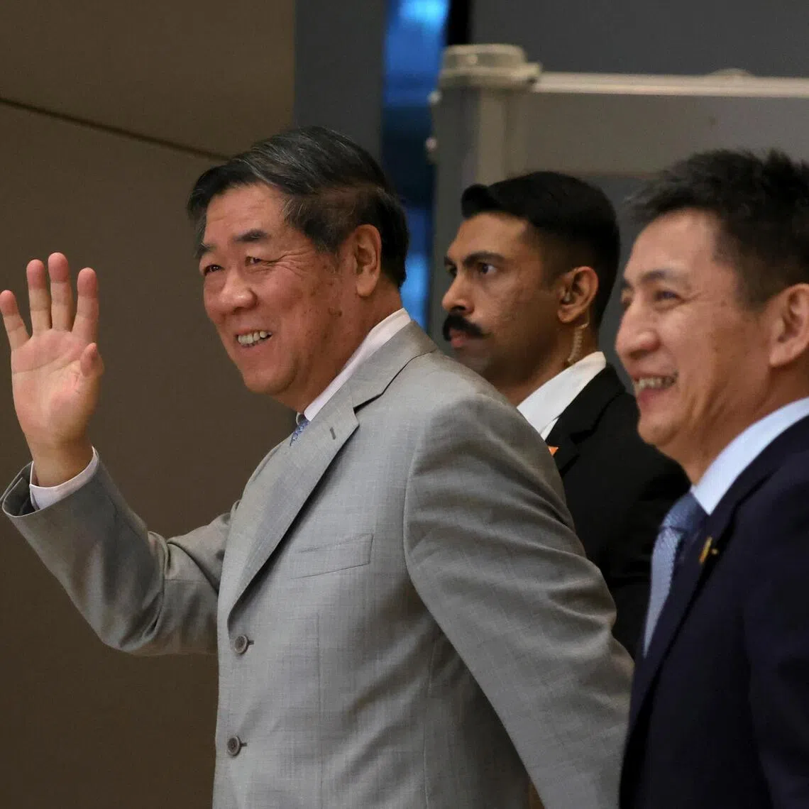 Chinese Vice Premier He Lifeng waves as he as he leaves a hotel during ongoing trade talks between the United States and China, in Kuala Lumpur, Malaysia, on Oct 25, 2025.