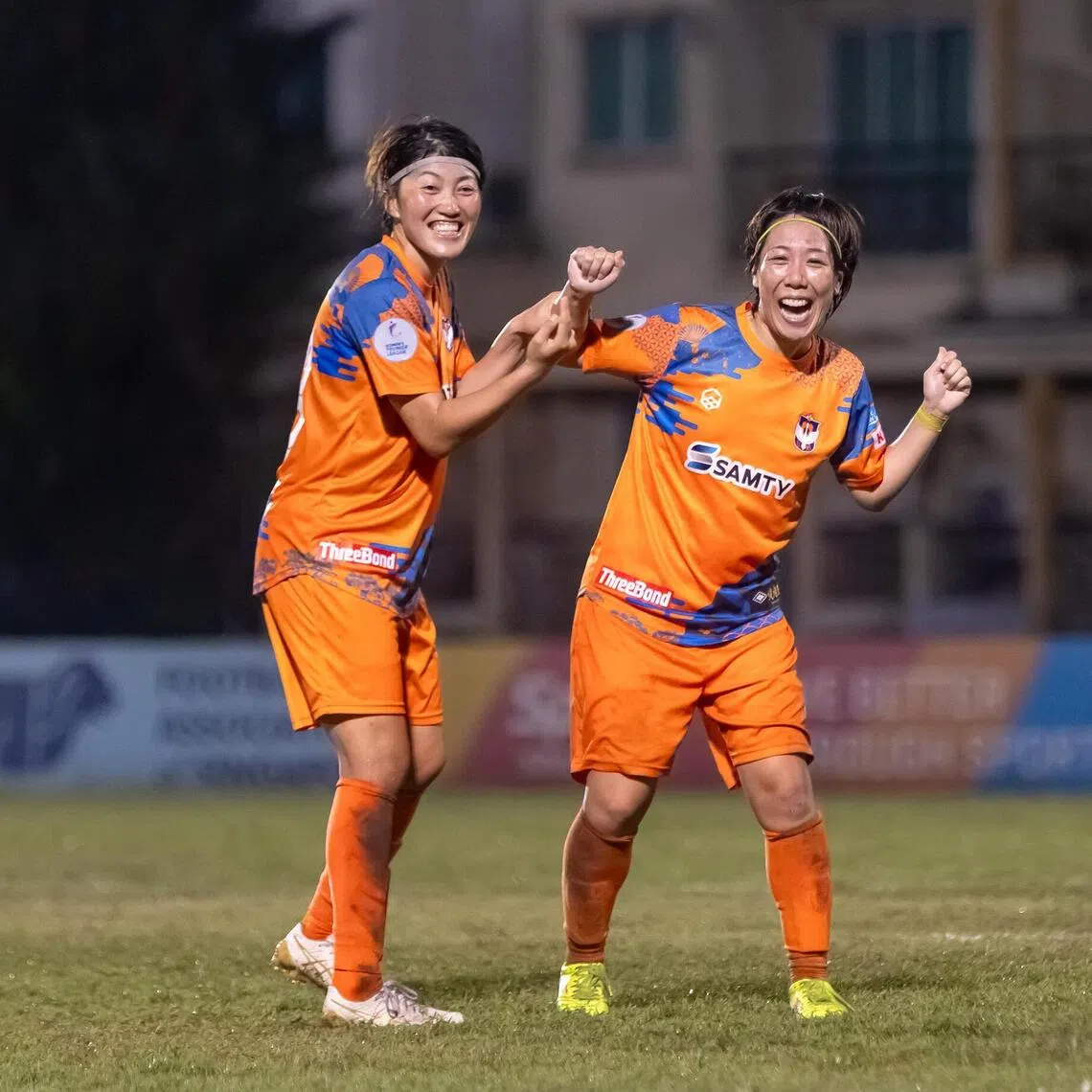 kksoc28 - Albirex Niigata players Ruriko Takashima (left) and Manami Fukuzawa celebrating during their 13-0 win over Balestier in the Women's Premier League (WPL) on Sept 10, 2025. Albirex clinched the WPL title on Sept 10 with one game to go, after claiming 42 points from 15 games this season.
Credit: Leo Shengwei / Playmaker