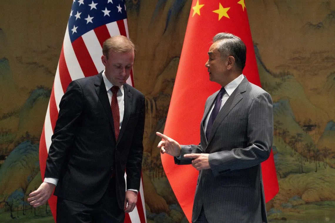 FILE PHOTO: Wang Yi, the director of the Communist Party's Central Foreign Affairs Commission Office gestures near White House National Security Adviser Jake Sullivan before talks at Yanqi Lake in Beijing, China, August 27, 2024. Ng Han Guan/Pool via REUTERS/File Photo