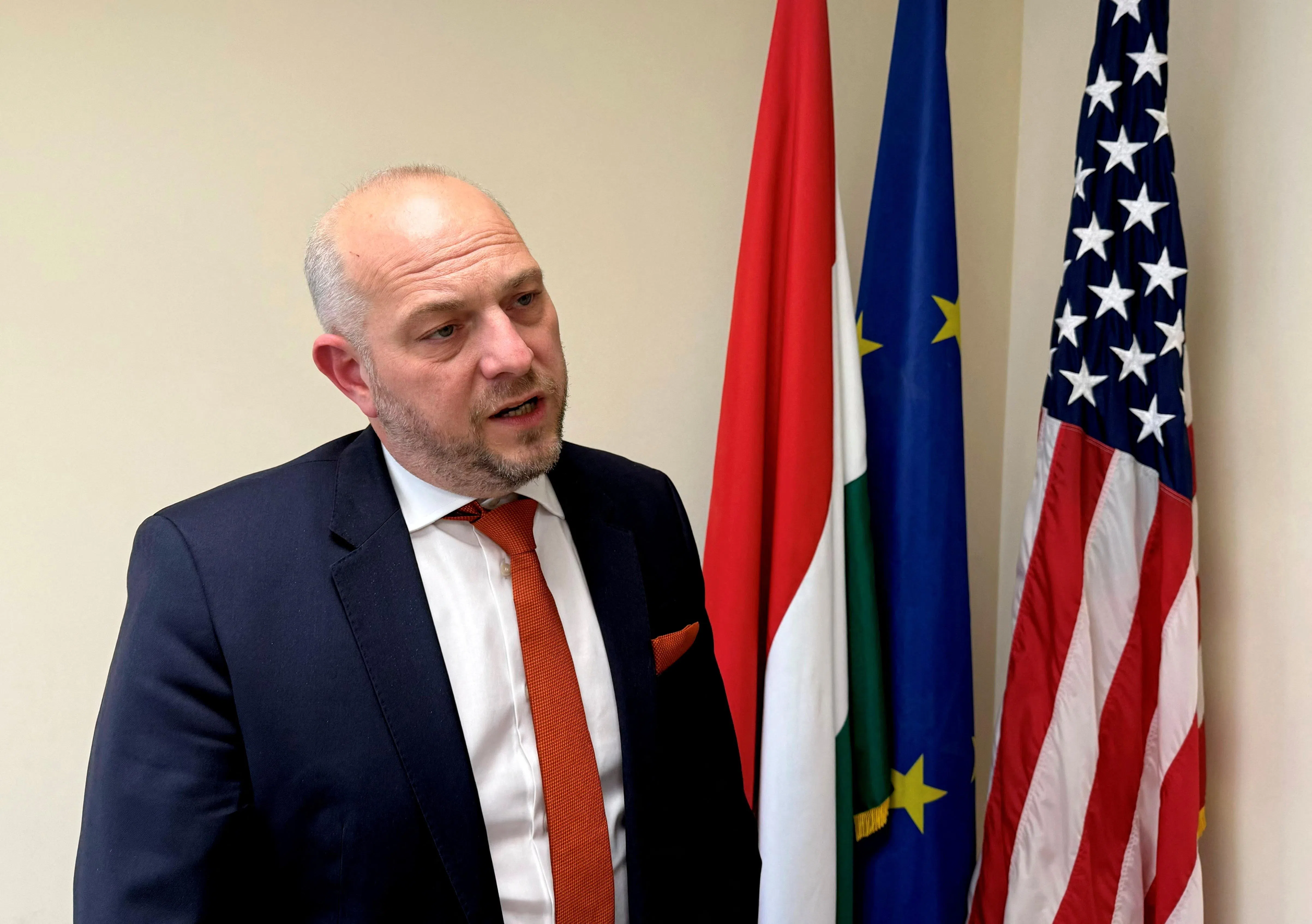 American Chamber of Commerce Hungary President Akos Janza speaks to Reuters during an interview at the group's headquarters in Budapest, Hungary, April 21, 2026. REUTERS/Gergely Szakacs