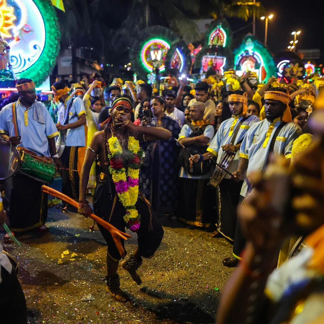 A Hindu devotee in a trance state during a procession at the Thaipusam Festival in Kuala Lumpur.