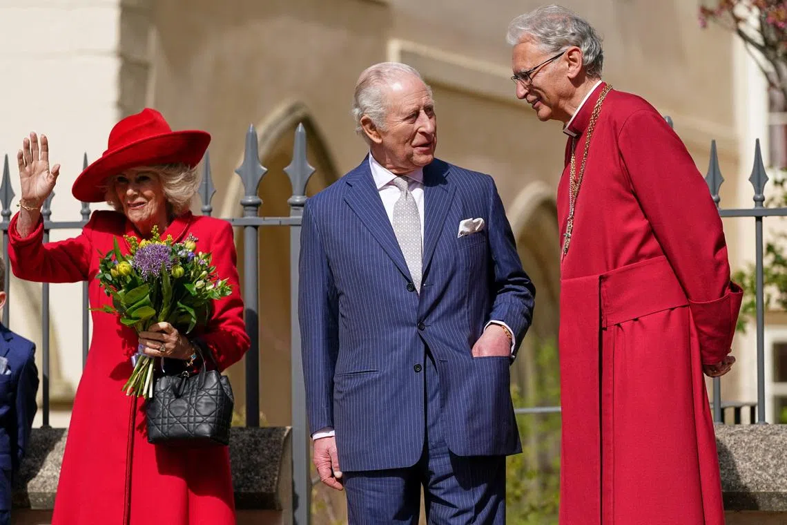 Britain's King Charles and Queen Camilla talk to Reverend Christopher Cocksworth as they leave after attending the Easter Matins Service at St. George's Chapel in Windsor, Britain, April 5, 2026. Alberto Pezzali/Pool via REUTERS
