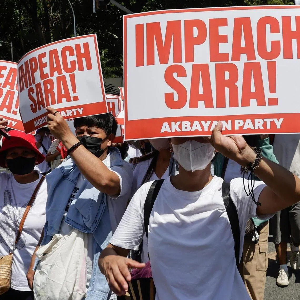 Protesters during a rally calling for the impeachment of Philippine Vice-President Sara Duterte in Quezon City, Metro Manila, on May 11.
