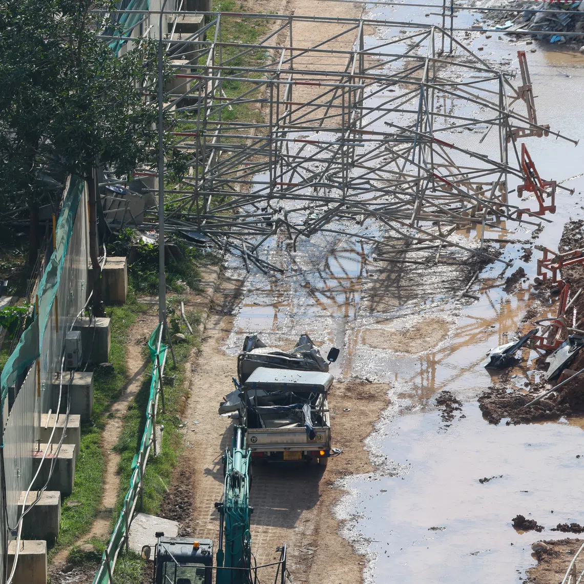 A 23-year-old worker was found trapped in the driver’s seat of a lorry after scaffolding collapsed on the vehicle at a construction site in Jurong Port Road on Aug 3.