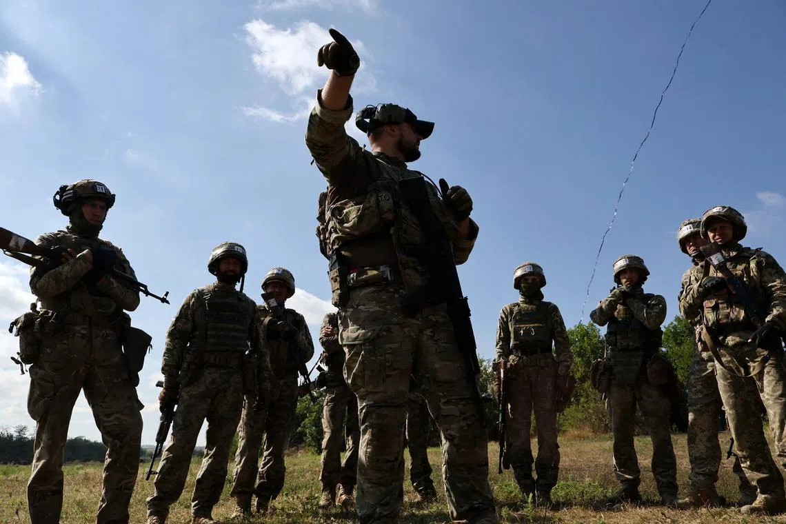 FILE PHOTO: Recruits of the 65th Separate Mechanized Brigade of the Ukrainian Armed Forces attend a military drill near a frontline, amid Russia's attack on Ukraine, in Zaporizhzhia region, Ukraine August 25, 2025. Andriy Andriyenko/Press Service of the 65th Separate Mechanized Brigade of the Ukrainian Armed Forces/Handout via REUTERS/File Photo