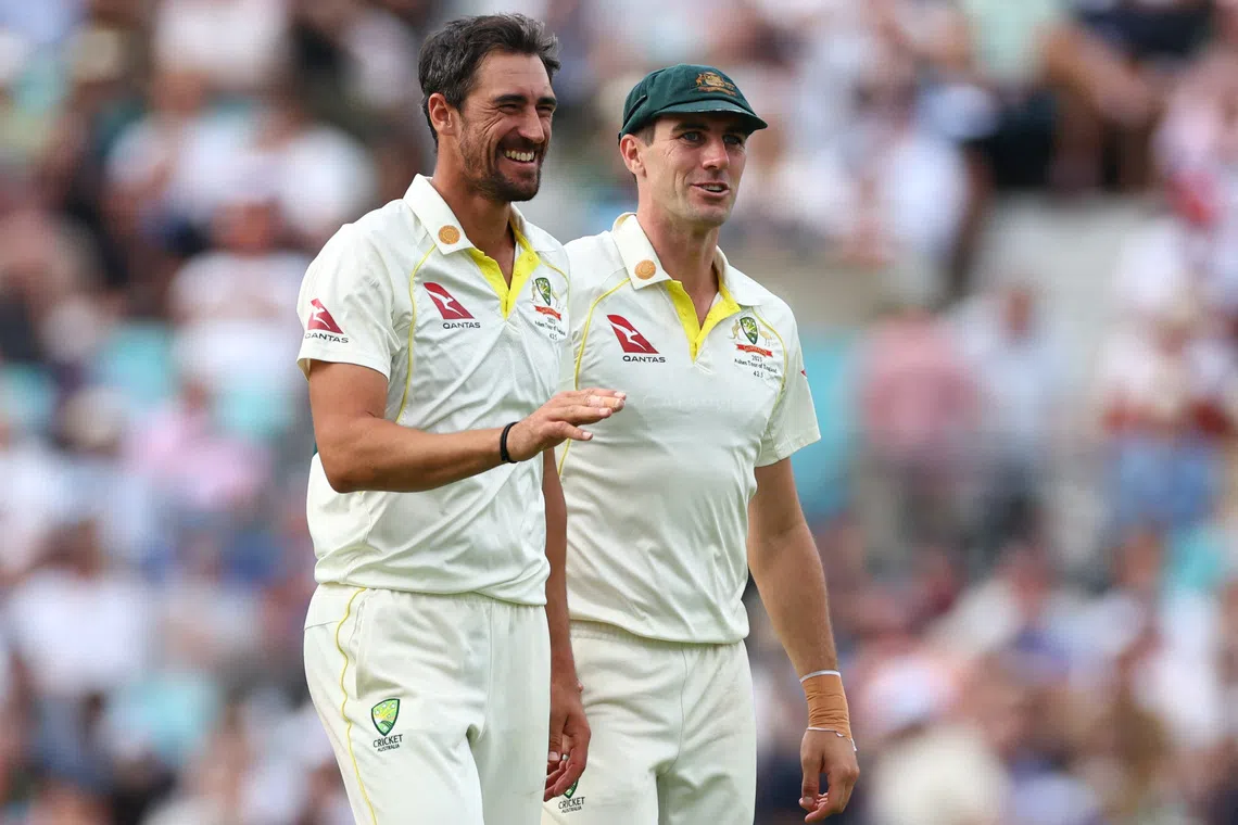 FILE PHOTO: Cricket - Ashes - Fifth Test - England v Australia - The Oval, London, Britain - July 29, 2023  Australia's Mitchell Starc celebrates with Pat Cummins after taking the wicket of England's Chris Woakes caught by Usman Khawaja Action Images via Reuters/Andrew Boyers/File Photo