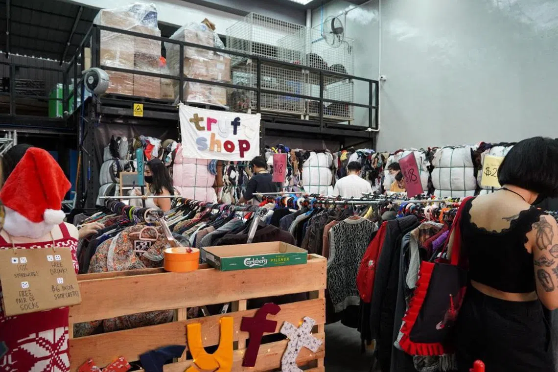 A warehouse sale of second-hand clothing by Singaporean pop-up thrift store Tryft Shop