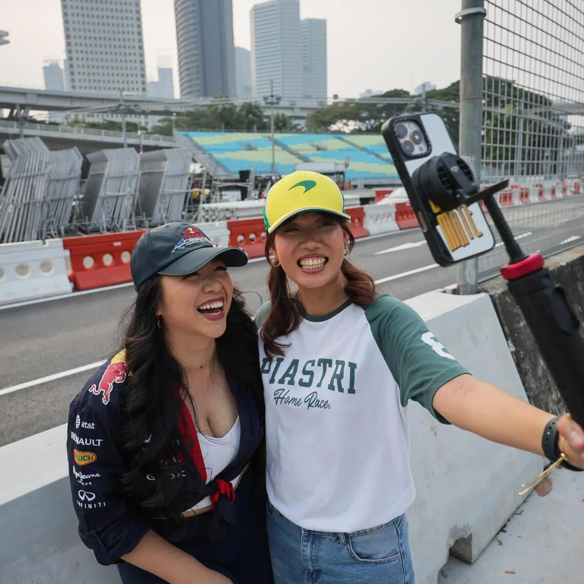 F1 content creators Dazale Choy (left) and Desiree Choo started out by providing fans with information on the Singapore Grand Prix circuit and fringe activities.