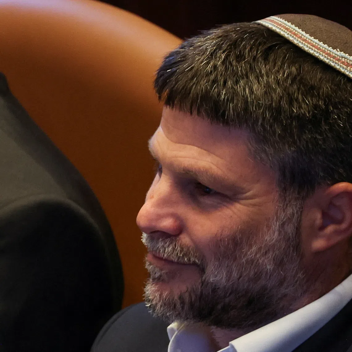 FILE PHOTO: Israeli Finance Minister Bezalel Smotrich attends a Plenum session of the Knesset, Israel's Parliament, also attended by Argentine President Javier Milei (not pictured), in Jerusalem, June 11, 2025 REUTERS/Ronen Zvulun/File Photo