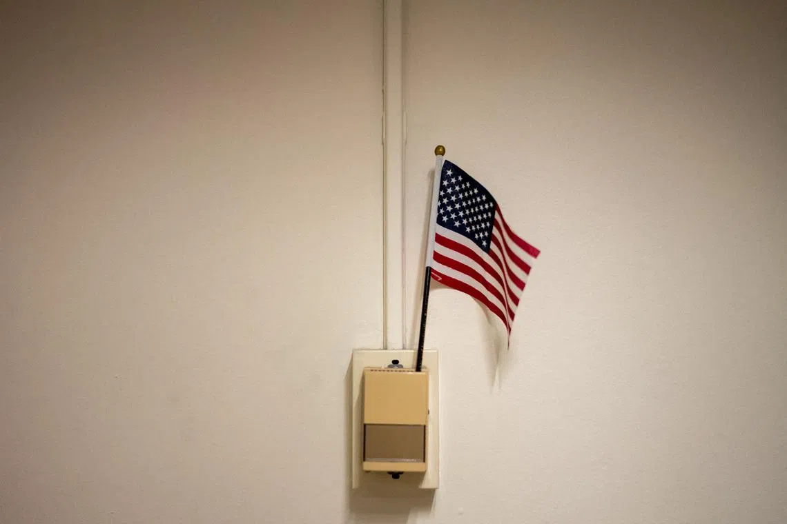 An American flag sits in a thermostat at U.S. immigration court in Manhattan, in New York City, U.S., November 28, 2025. REUTERS/David 'Dee' Delgado