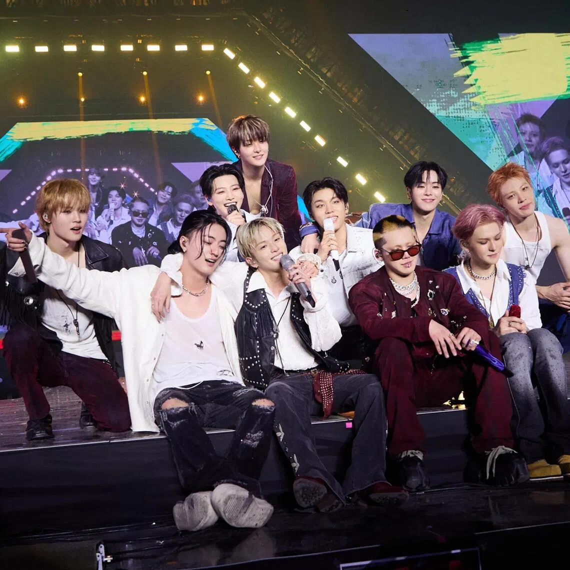 K-pop boy group Treasure, comprising (from far left) Doyoung, Haruto, Junkyu, Jihoon (back), Asahi (front), Park Jeong-woo, Choi Hyun-suk, Yoon Jae-hyuk, Yoshi and So Jung-hwan, performing at the KSPO Dome in Seoul in October 2025.