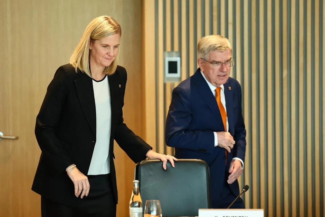 New International Olympic Committee president-elect Kirsty Coventry with outgoing chief Thomas Bach. 