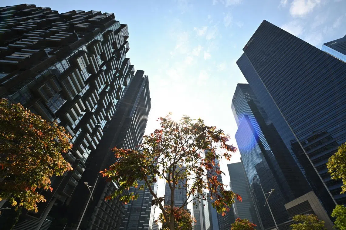 Generic photograph of office buildings in Marina Bay Financial Centre in the CBD area on June 19, 2023. Can be used for stories on money, population, property, land, commercial, office, invest, budget, income, bank, finance, financial, CBD, URA, population, economy, and development.