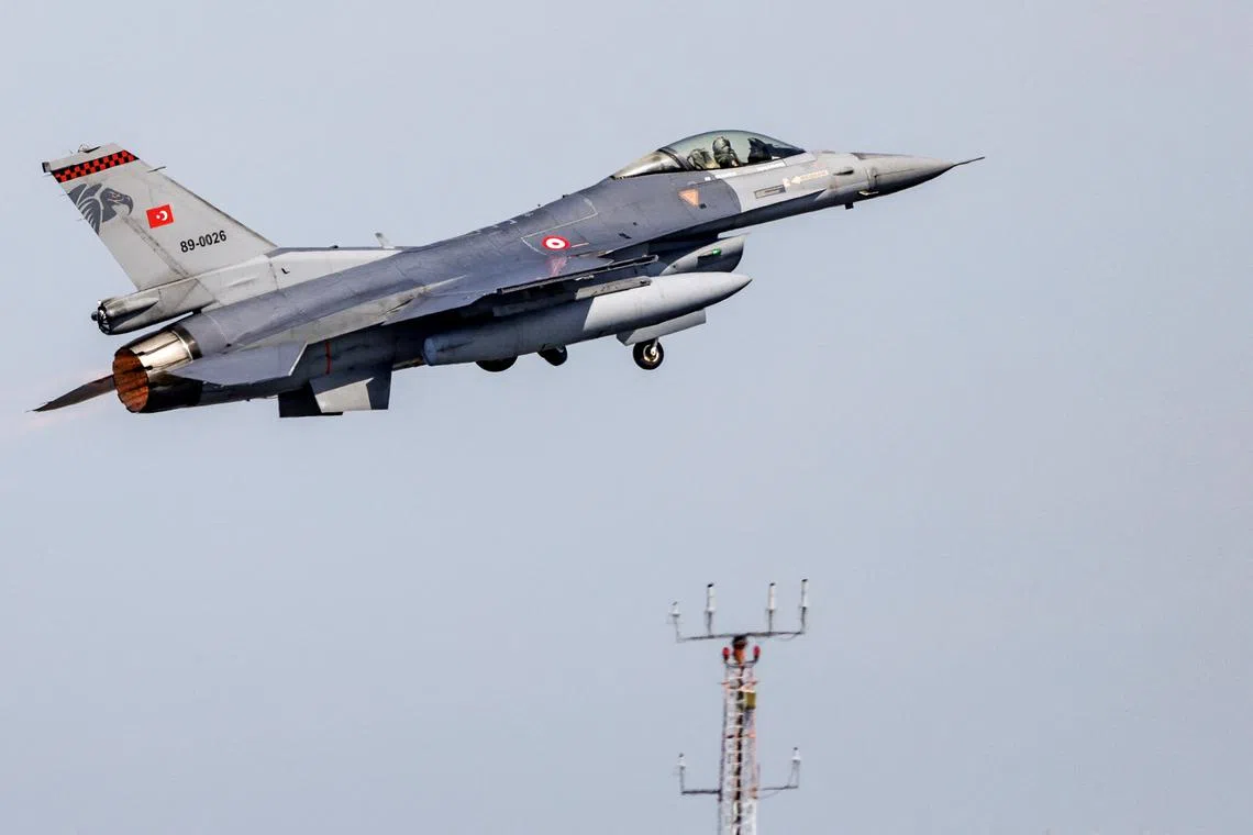 FILE PHOTO: An F-16 combat jet aircraft of the Turkish airforce takes off at the Air Defender Exercise 2023 at the military airport of Jagel, northern Germany, June 9, 2023. Axel Heimken/Pool via REUTERS/File Photo
