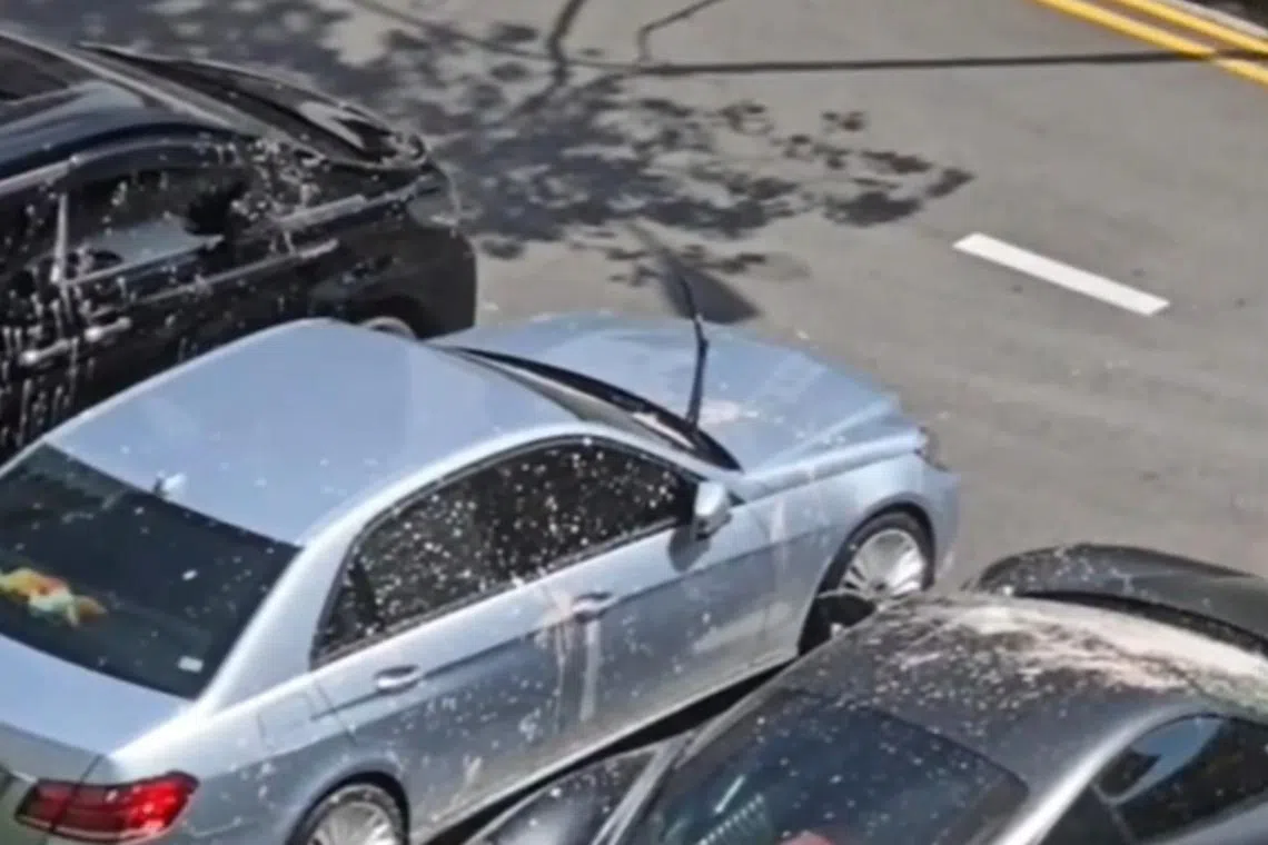 Part of a sedan’s windscreen also appears to have been smashed.