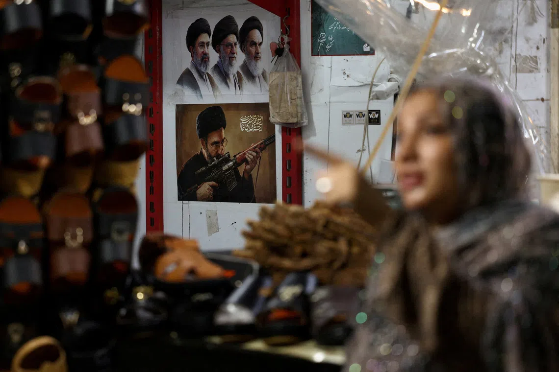 A picture of Iran’s Supreme Leader, Mojtaba Khamenei, is displayed at a store in a local market in Bandar Abbas, Iran.