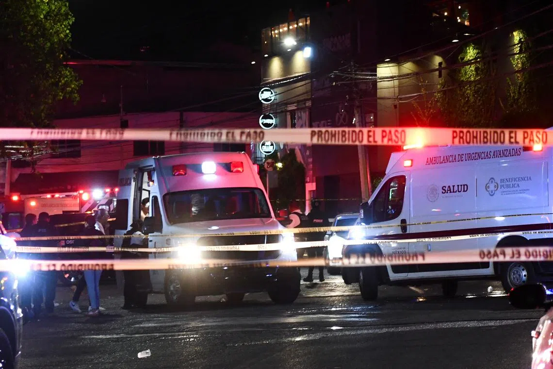 Authorities work at a crime scene where gunmen entered a bar killing and injuring several people, in Santiago de Queretaro, Queretaro state, Mexico November 9, 2024. REUTERS/Angel Merida