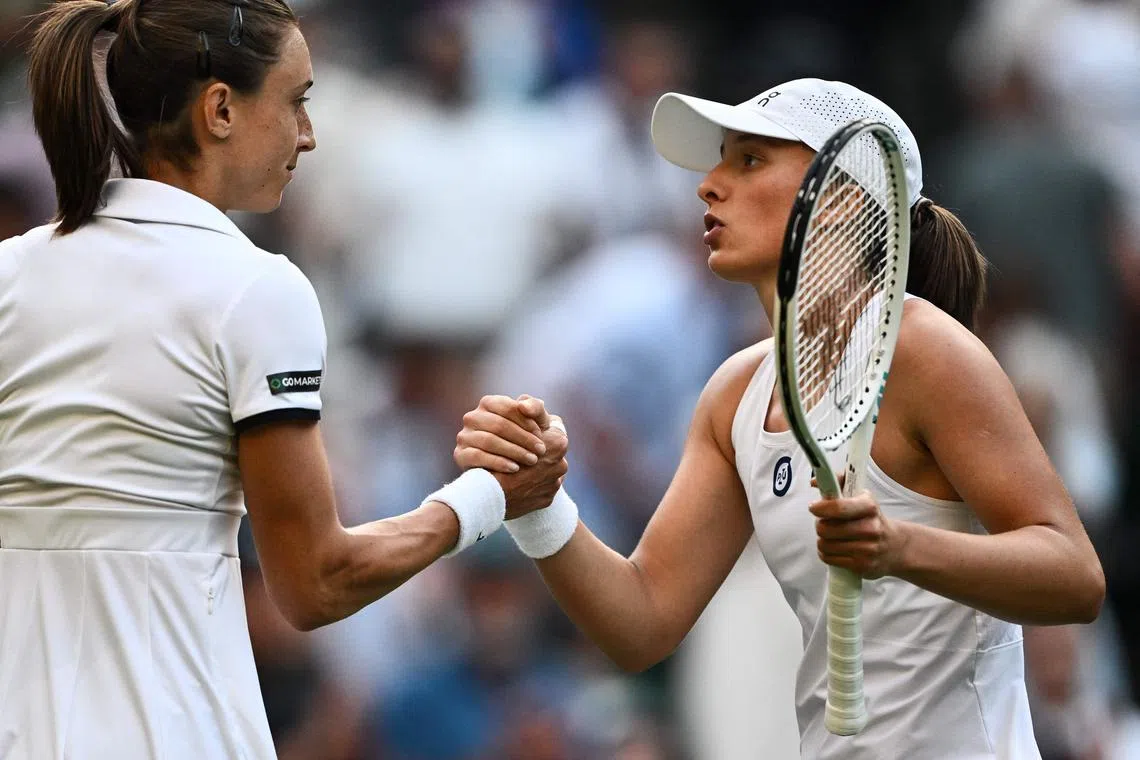 Poland's Iga Swiatek (right) has reached the fourth round of Wimbledon without dropping a set.