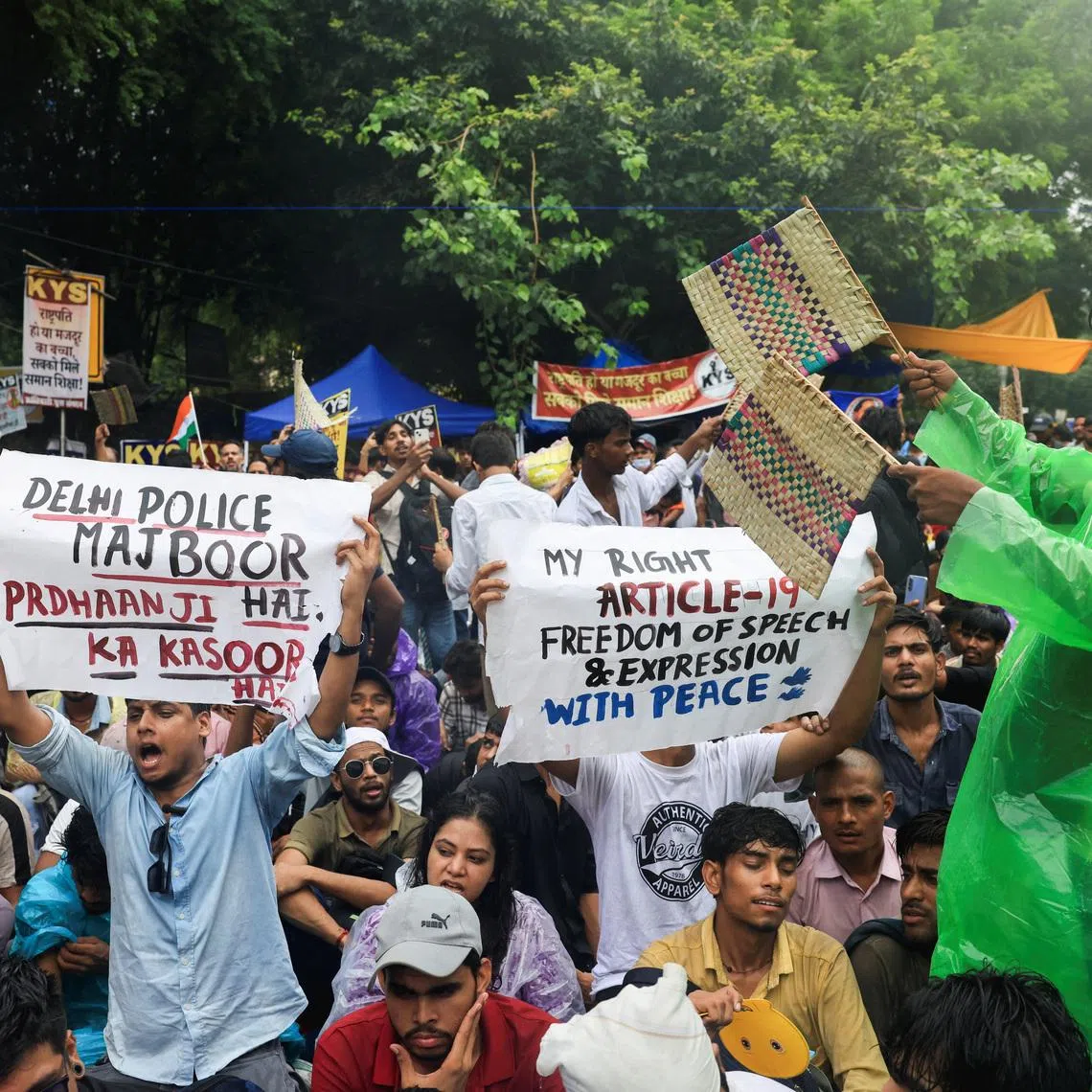 Supporters of India’s Cockroach Janata Party chant slogans during protests on July 24.