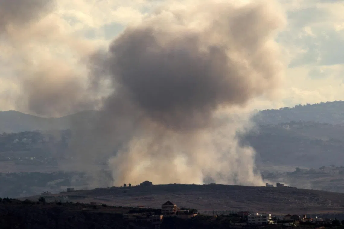 Smoke billows from the site of an Israeli strike targeting the southern Lebanese border area of Bani Hayyan on Sept 19.