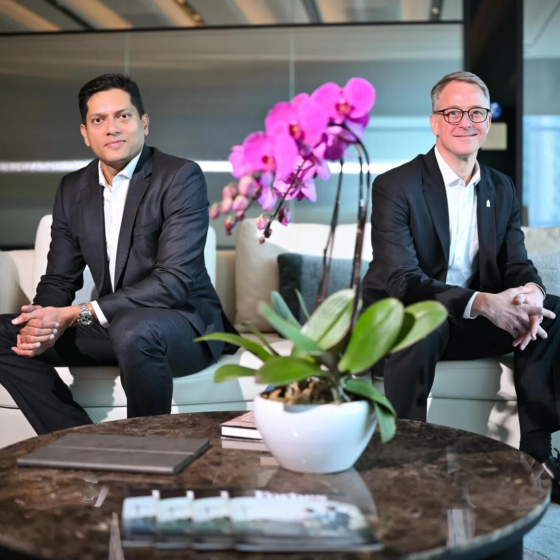 Interview with Praveen Gregory, (left) 44, Managing Director of DHL Global Forwarding for Singapore, Malaysia and Brunei; together with James Nesbitt, (right) 51, Managing Director and Head of Global Subsidiaries for Singapore and ASEAN, Standard Chartered; on their business partnership, ahead of the Singapore GP at Standard Chartered's office on Sept 3.