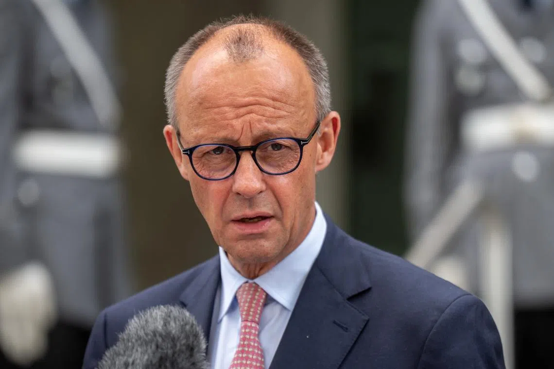 FILE PHOTO: German Chancellor Friedrich Merz gives a statement following his visit to the Operational Command of the German armed forces Bundeswehr in Schwielowsee near Berlin, Germany, June 28, 2025. Michael Kappeler/Pool via REUTERS/File Photo