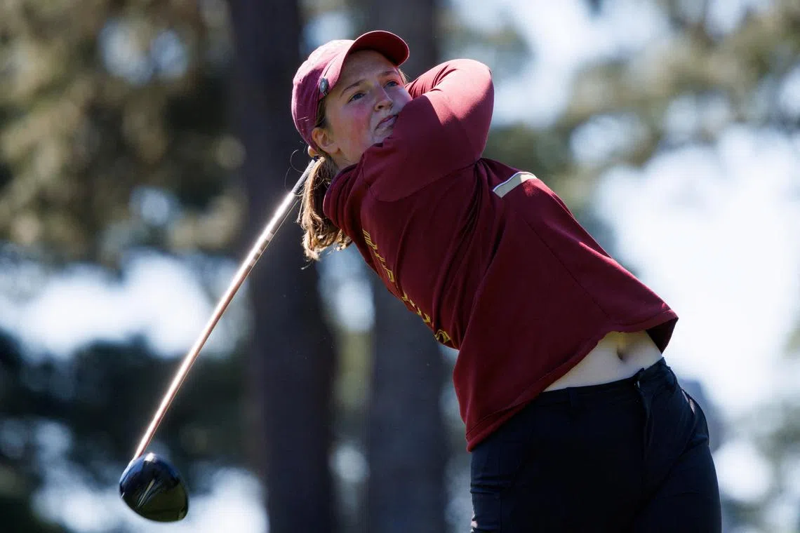 FILE PHOTO: Golf - Augusta National Women's Amateur - Augusta National Golf Club, Augusta, Georgia, United States - April 6, 2024  England's Lottie Woad hits off the third tee during the final round  REUTERS/Mike Blake/ File Photo