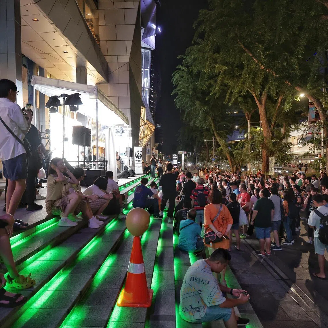 An outdoor event at Wisma Atria as seen before the WWF Earth Hour Switch Off moment on March 23, 2024. Businesses are recognising the value of shopping experiences and are crafting new ways to boost customer loyalty and generate foot traffic in competitive environments instead of relying solely on traditional retail.