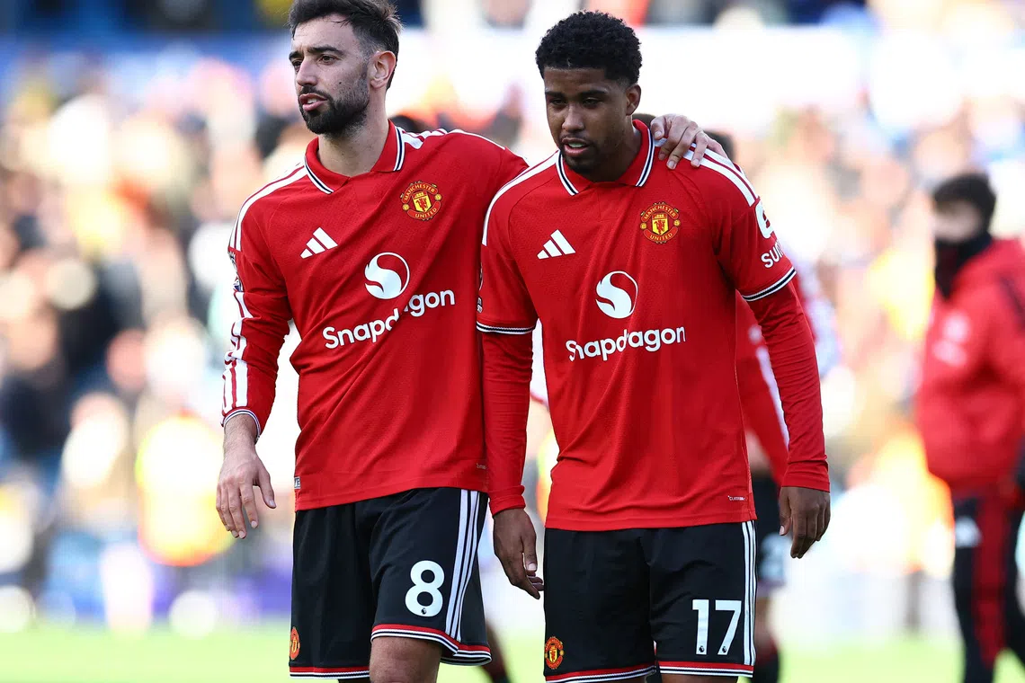 Soccer Football - Premier League - Leeds United v Manchester United - Elland Road, Leeds, Britain - October 18, 2026 Manchester United's Bruno Fernandes and Andrey Santos at the end of the match REUTERS/Phil Noble