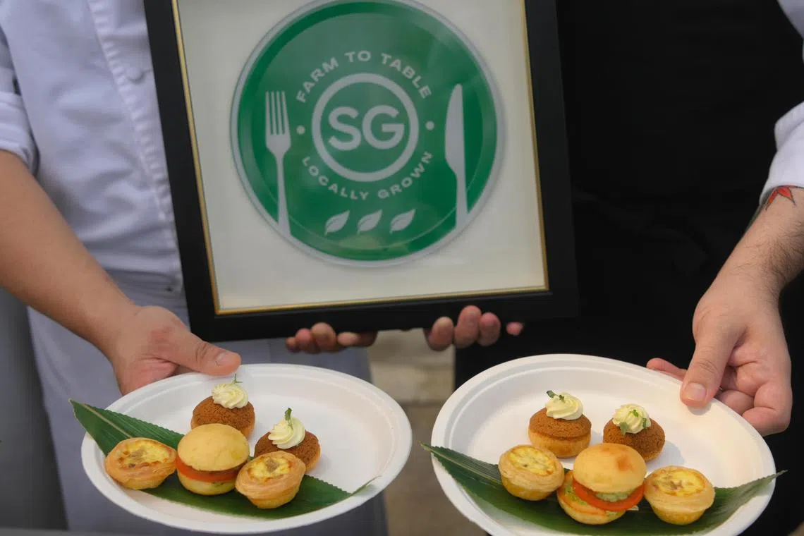 Chefs from Resorts World Sentosa with some dishes using locally sourced ingredients at the launch of the Farm-to-Table Recogniton Programme on March 27, 2023. 