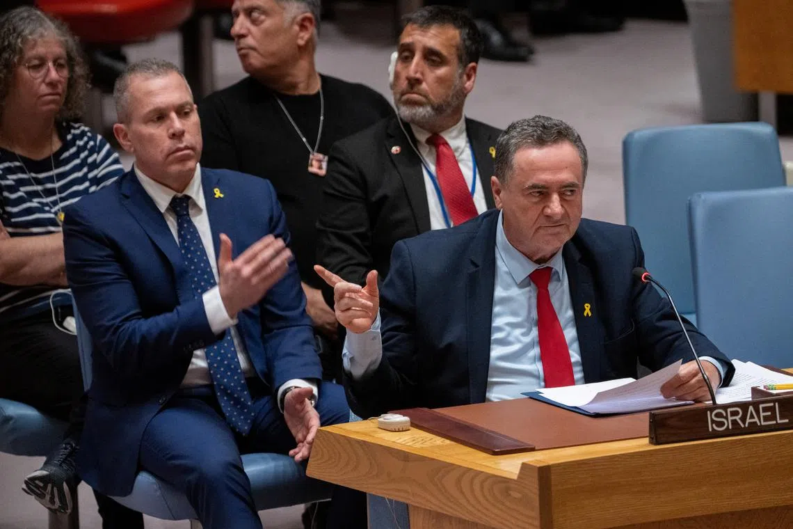 Israel Katz, Foreign Minister to the United Nations points at family members of hostages in the audience during a meeting of the United Nations Security Council on the conflict between Israel and Hamas, at U.N. headquarters in New York, U.S., March 11, 2024. REUTERS/David 'Dee' Delgado/ File Photo