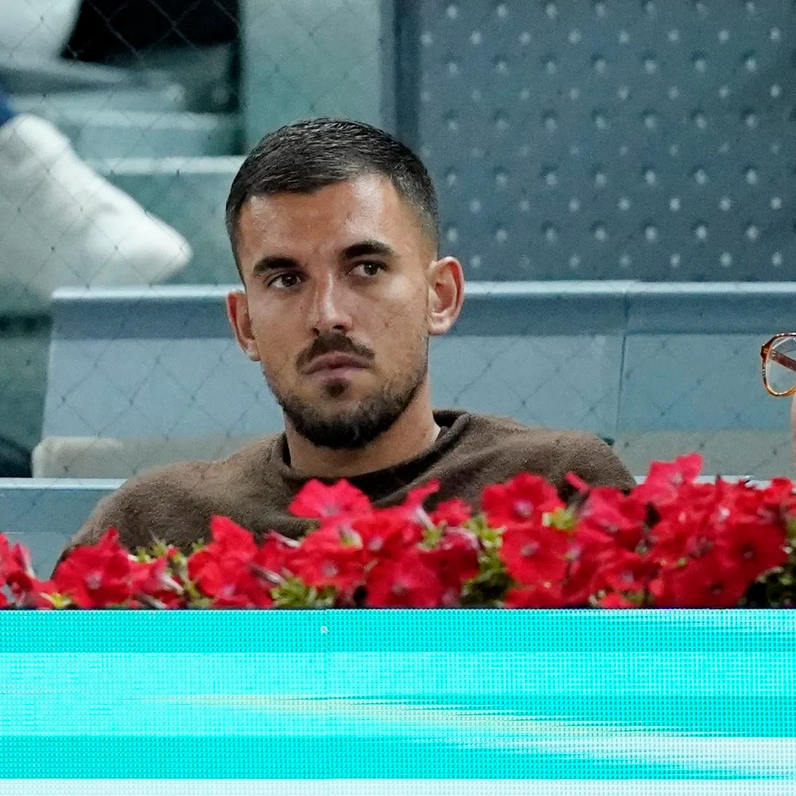 FILE PHOTO: Tennis - Madrid Open - Park Manzanares, Madrid, Spain - April 26, 2026  Football player Dani Ceballos is seen during the round of 32 match between Spain's Rafael Jodar and Brazil's Joao Fonseca REUTERS/Ana Beltran/File Photo