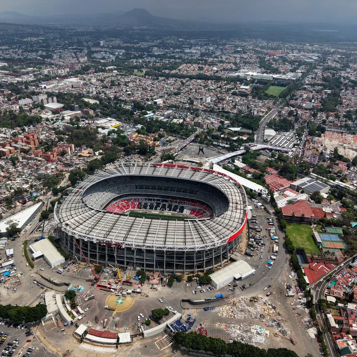 FILE PHOTO: A drone view of the Banorte Stadium, also known as Azteca Stadium, the venue that will host the opening match of the 2026 FIFA World Cup and become the first stadium to hold three World Cups (1970, 1986, 2026), in Mexico City, Mexico, March 17, 2026. REUTERS/Luis Cortes/File Photo
